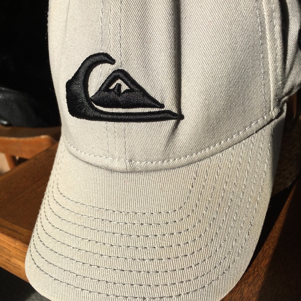 Quicksilver cap. Youth. New. Gray canvas with black quicksilver ensignia. Brim.